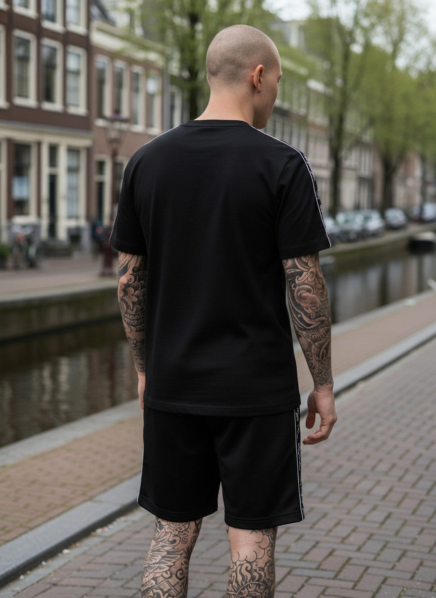 GABBERPLANET black cotton t-shirt with embroidered kangaroo logo and branded tape on sleeves.