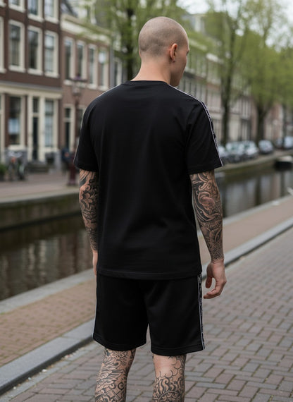 GABBERPLANET black cotton t-shirt with embroidered kangaroo logo and branded tape on sleeves.