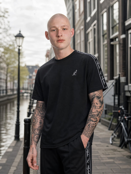 GABBERPLANET black cotton t-shirt with embroidered kangaroo logo and branded tape on sleeves.