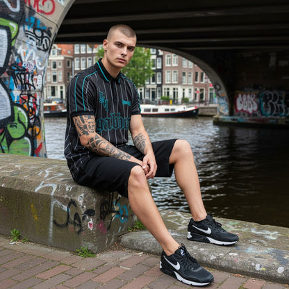 GABBERPLANET black polyester soccershirt with turquoise pinstripes, embroidered logos, and woven patch detail.