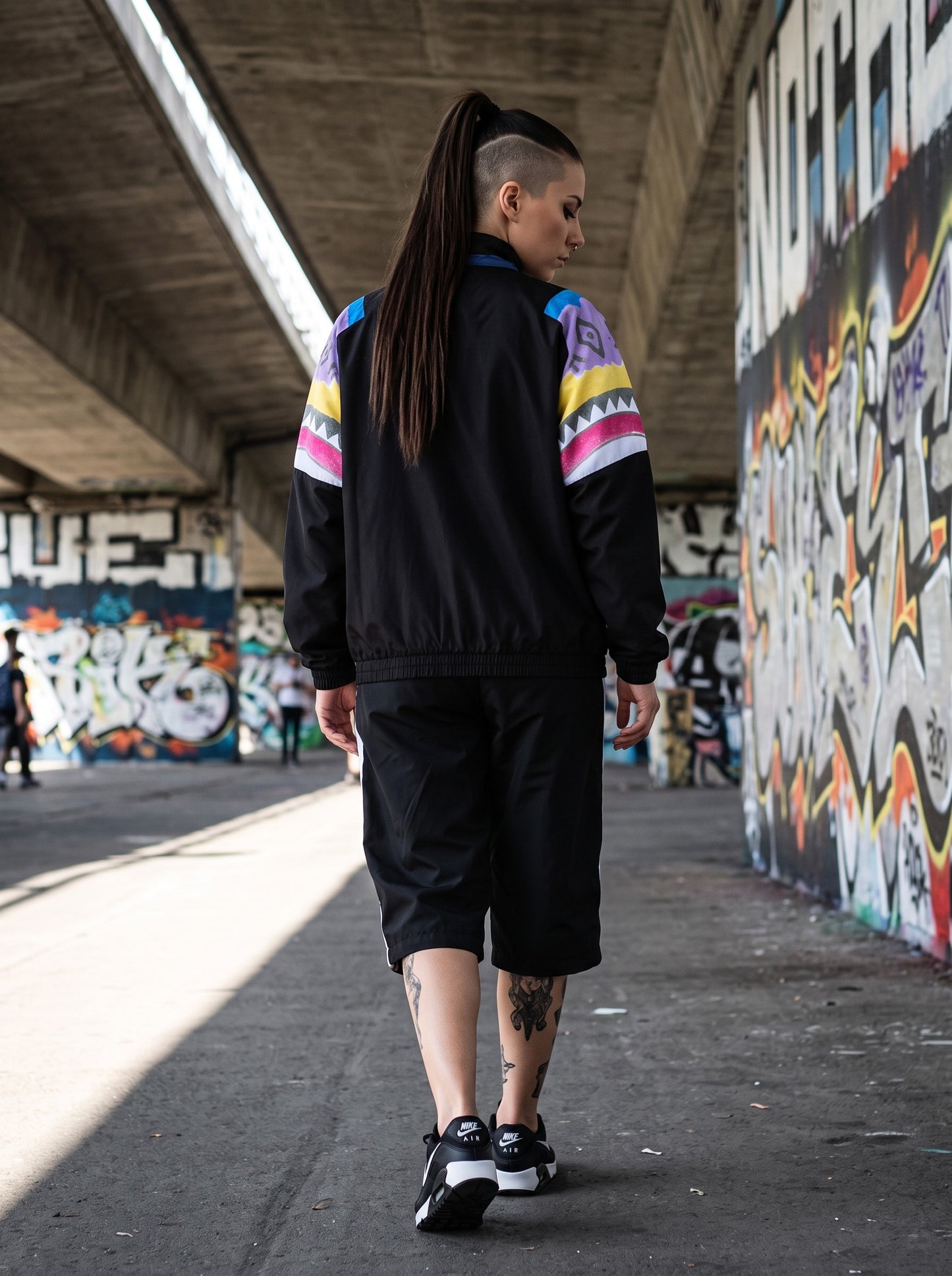 Giacca GABBERPLANET Australian Native Old Track Jacket nera con maniche a motivi geometrici colorati anni '90
