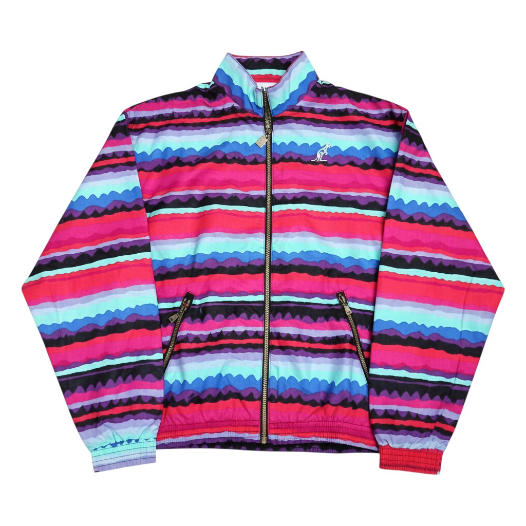 GABBERPLANET Special Edition KING COR-47 jacket with a vibrant horizontal stripe pattern in pink, purple, blue, and black. Features a full zip, stand-up collar, and kangaroo logo.