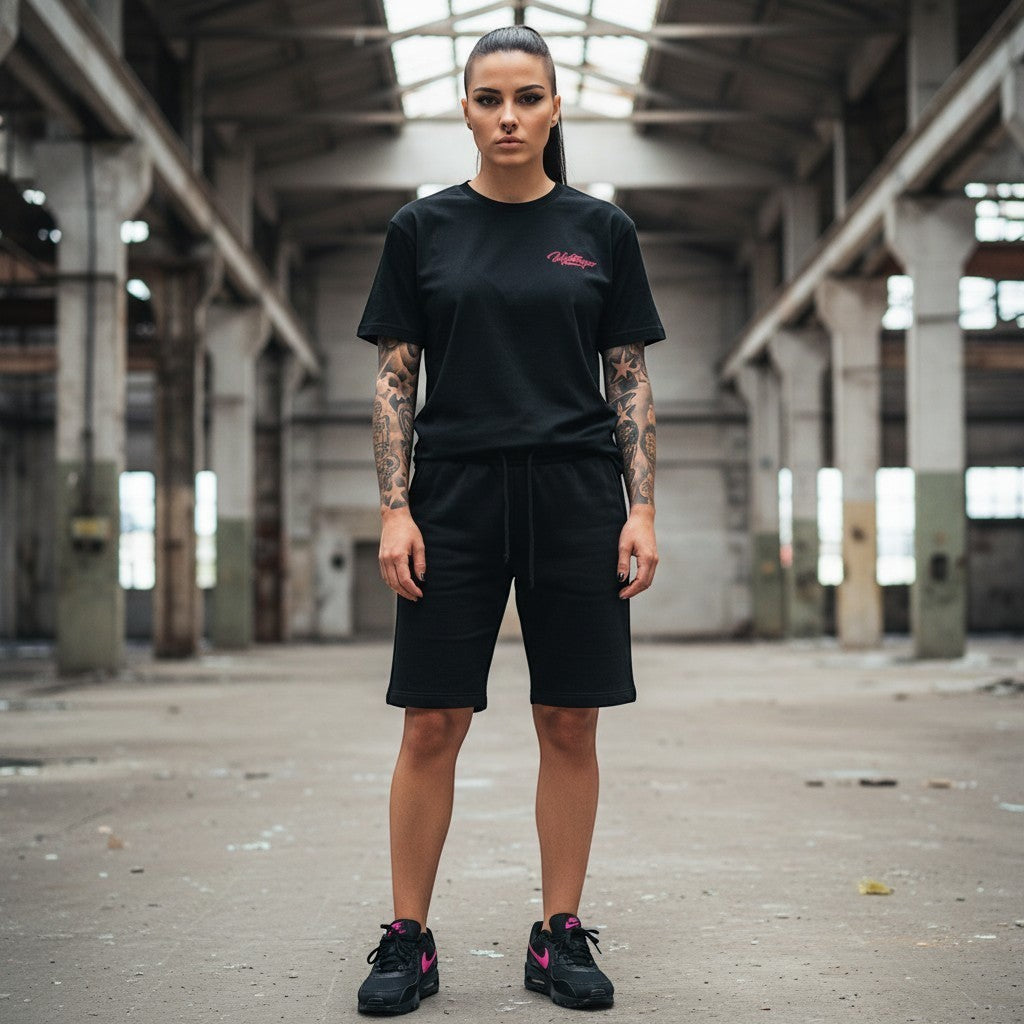 GABBERPLANET black cotton t-shirt with pink signature logo print on chest and back, loose fit.