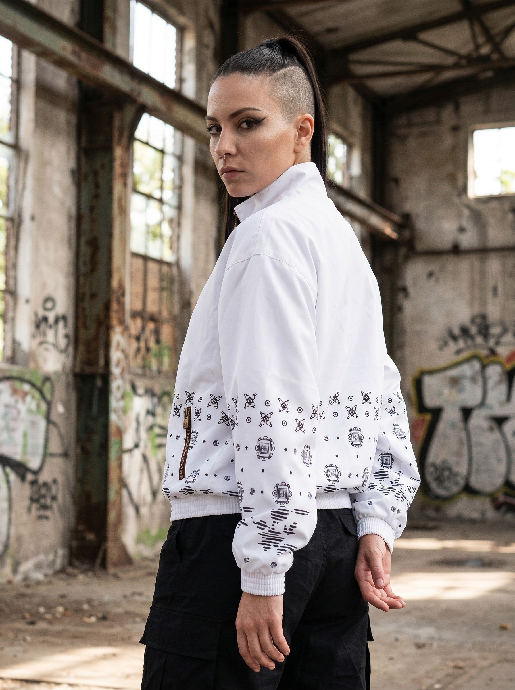 GABBERPLANET white track jacket with black graphic print on sleeves and hem, featuring a kangaroo logo.